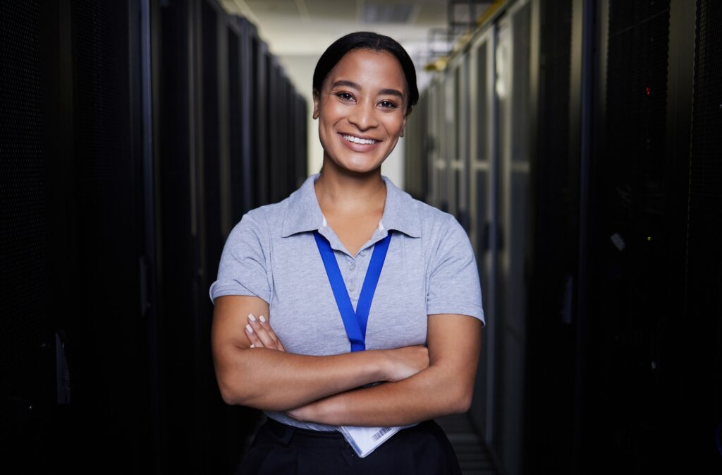 Server room, portrait or happy woman for online cybersecurity glitch, machine or servers system. IT